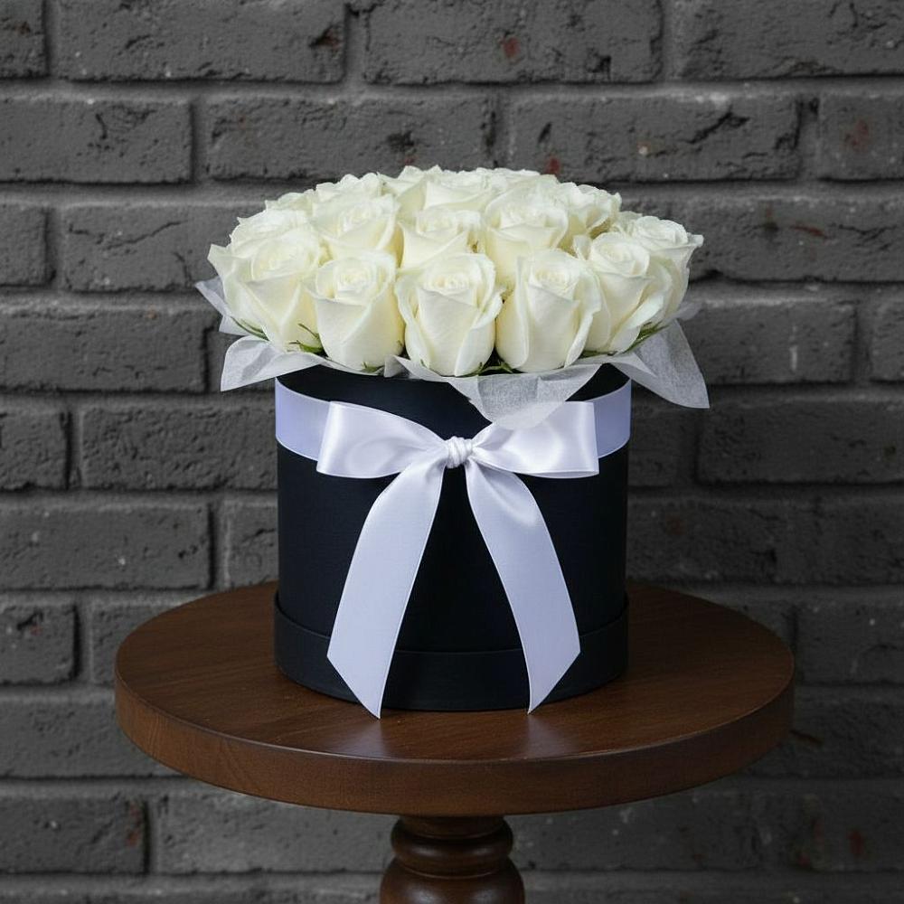 Цветочная композиция из Розы в шляпной коробке в Нижнем Тагиле